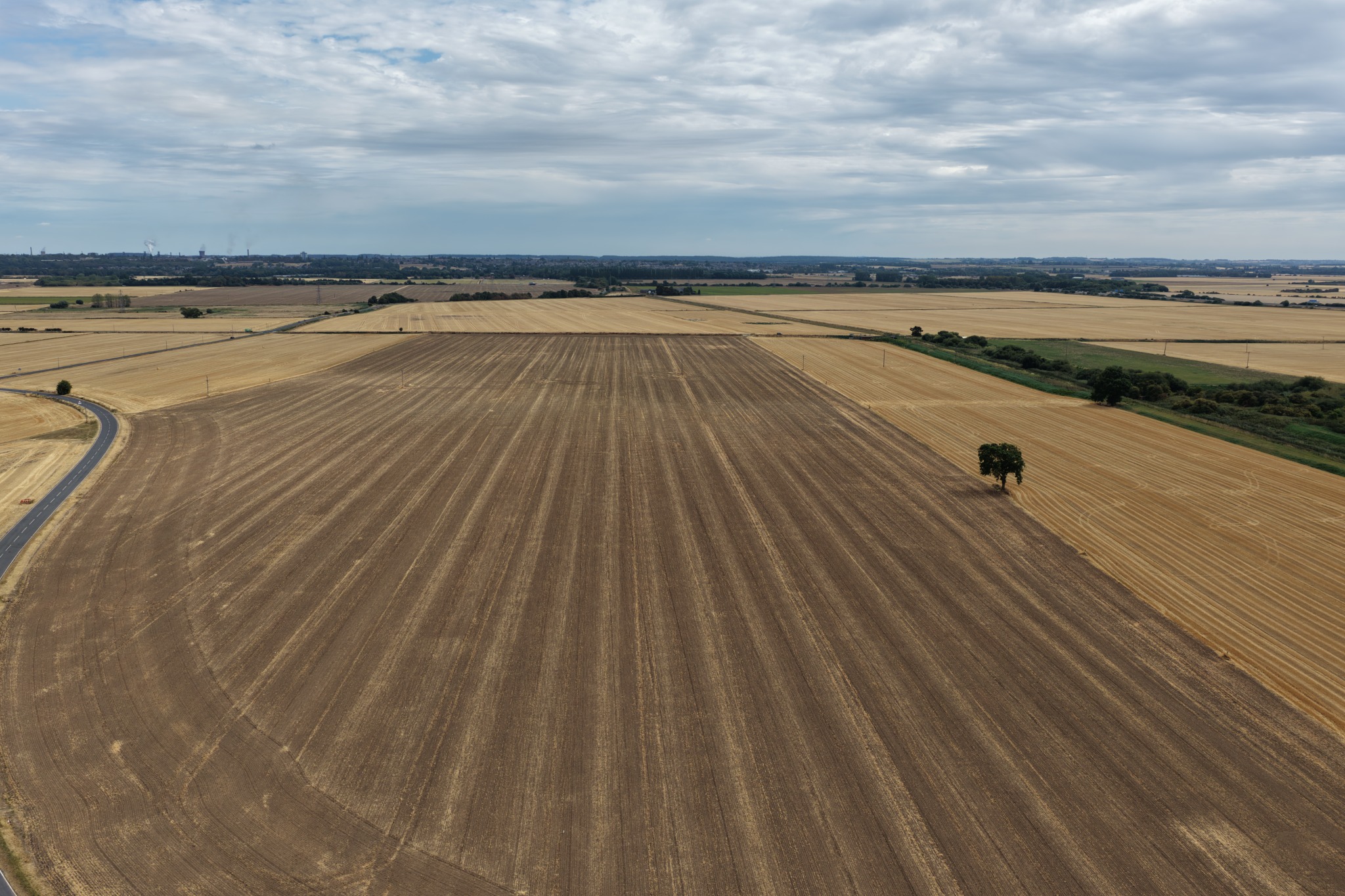 Aerial view across open fields